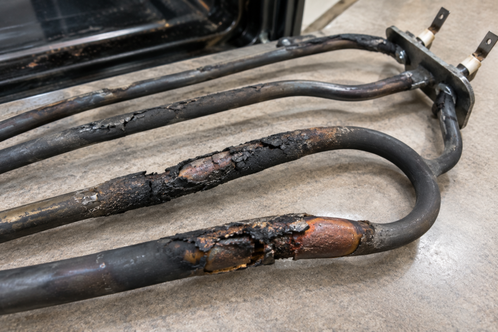 Burnt oven heating element that needs replacing